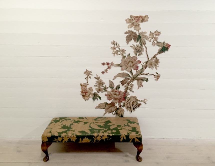 Janne Malmros, Unfold, 2007, floral pattern on a period, English oak foot-stool, cut out in one piece and arranged on wall, 35 x 96 x 107 cm (1)