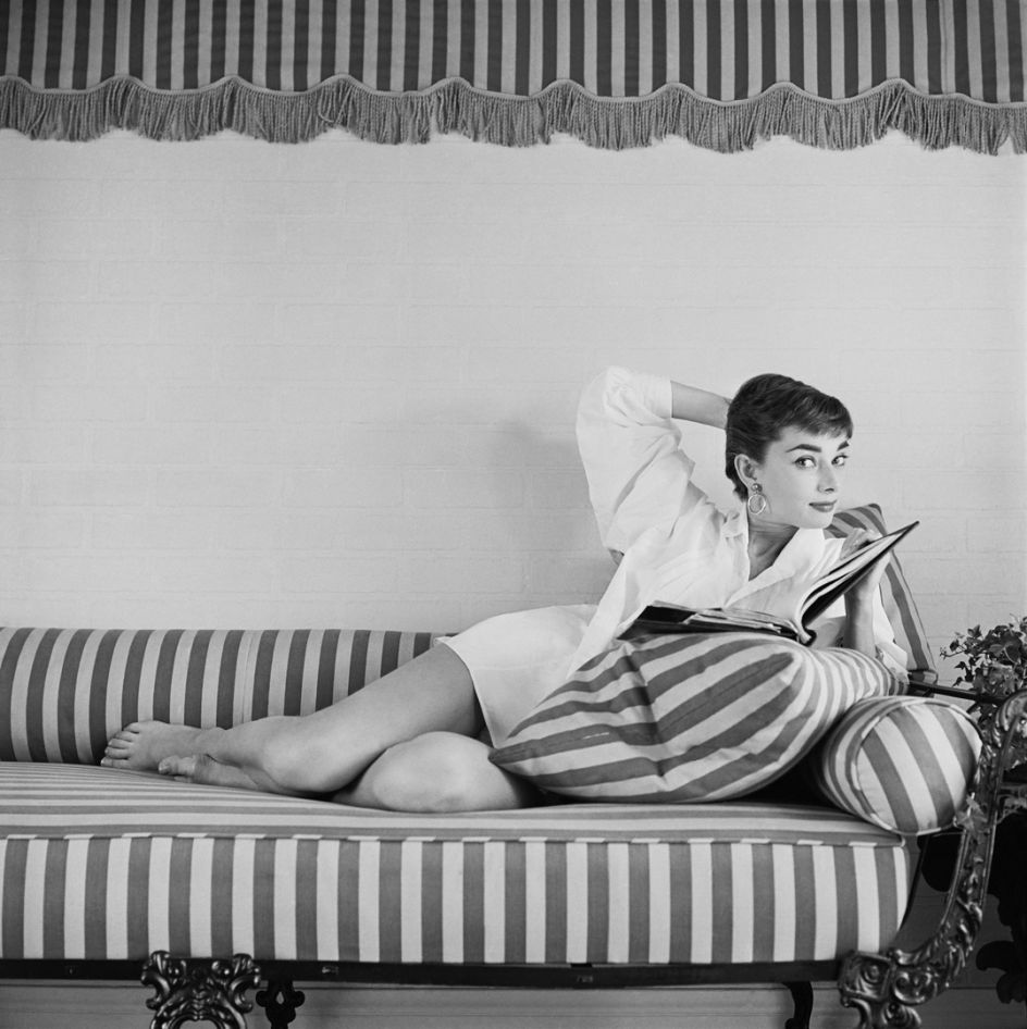 This photograph by Mark Shaw is an outtake from the cover of an international issue of LIFE magazine, first published 19th April, 1954. Audrey at Home on the Sun Lounger, 1954, Mark Shaw © Mark Shaw / mptvimages.com