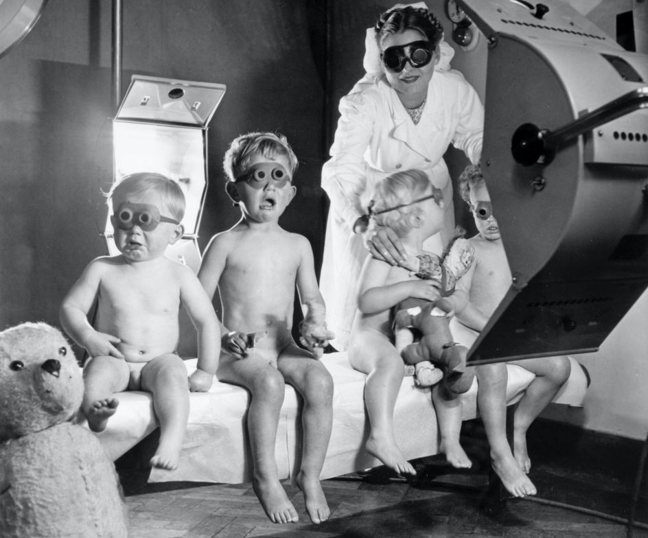 Children receive sun-lamp therapy, believed to have a curative effect on everything from chest infections to acne, in 1948. The link between UV rays and skin cancer was then unknown