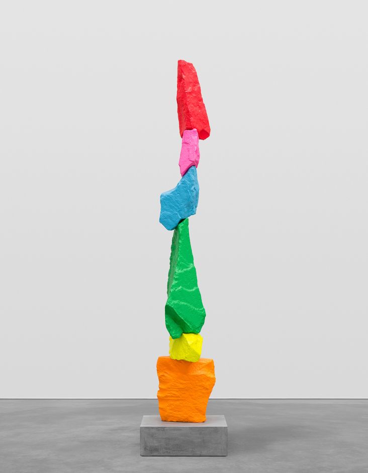 Ugo Rondinone orange yellow green blue pink red mountain 2015 Painted stone, stainless steel, plywood, concrete Sculpture 193 × 46 × 29 cm Pedestal 15 × 45 × 45 cm Overall 208 × 46 × 45 cm Image courtesy of Sadie Coles HQ, London © Ugo Rondinone
