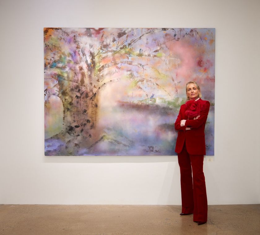 Sharon Stone with her paintings at the East Coast premiere of her art exhibition Courtesy of C. Parker Gallery in Greenwich, Connecticut. Stone has two new exhibitions in Berlin and San Francisco