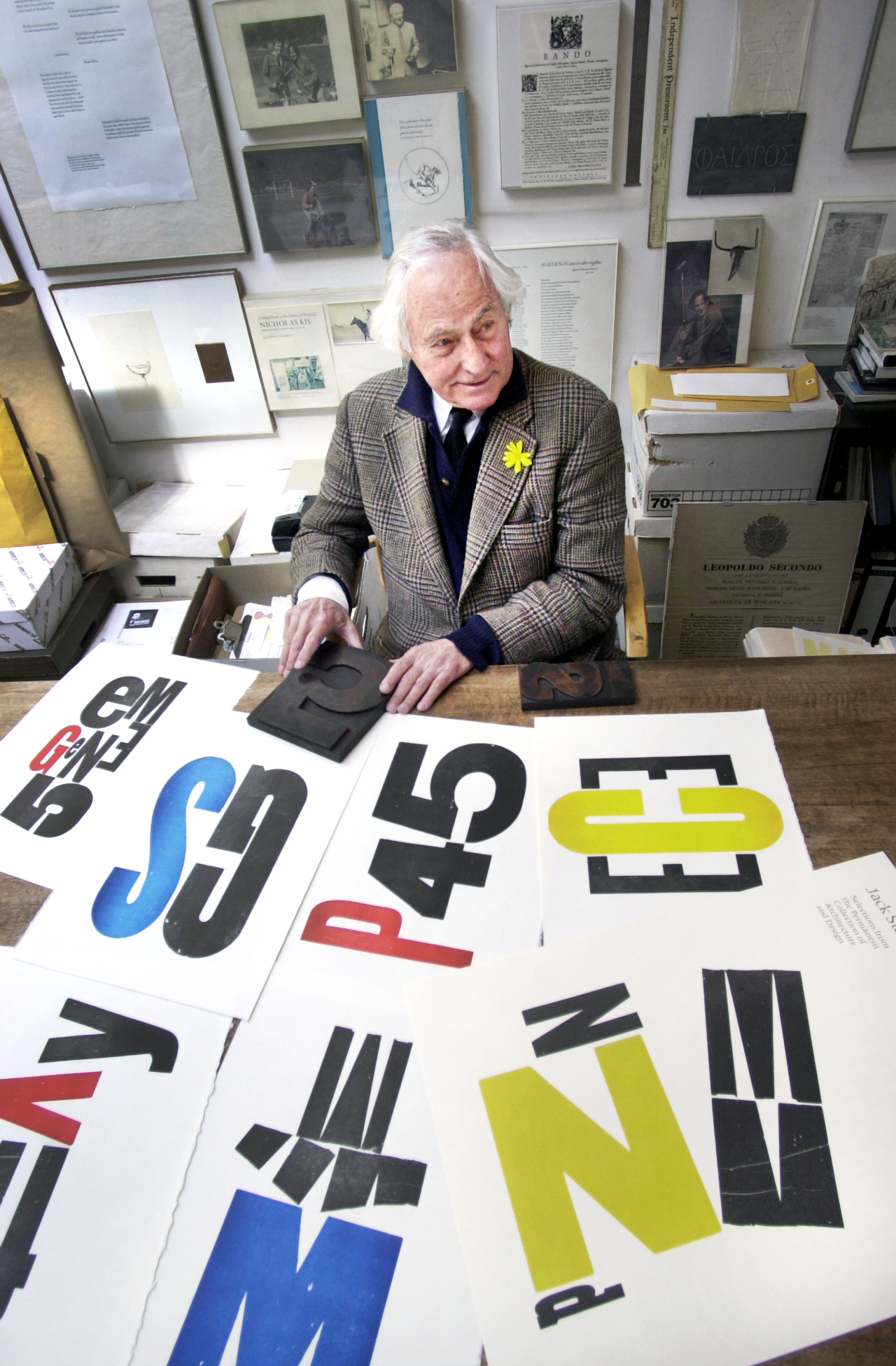 Jack Stauffacher at his Greenwood Press studio with prints from Wooden Letters from 300 Broadway, 2002. Photograph Dino Vournas