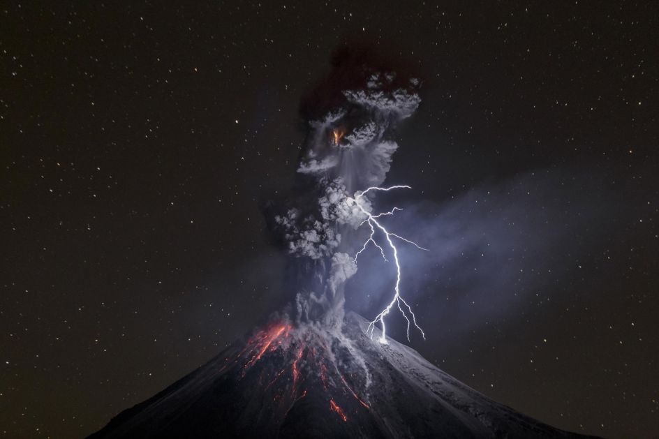 Nature, third prize singles: Colima Volcano in Mexico shows a powerful night explosion with lightning, ballistic projectiles and incandescent rockfalls; image taken in the Comala municipality in Colima, Mexico. Sergio Tapiro.