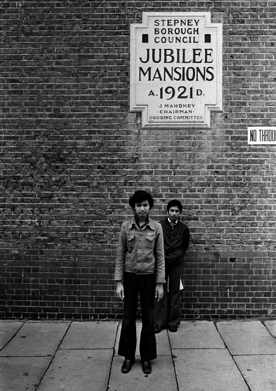 Jubilee Street, Stepney, London 1977. The photograph was taken during the celebrations of Queen Elizabeth II Silver Jubilee as a statement of reaction to Britain’s multiculturalism