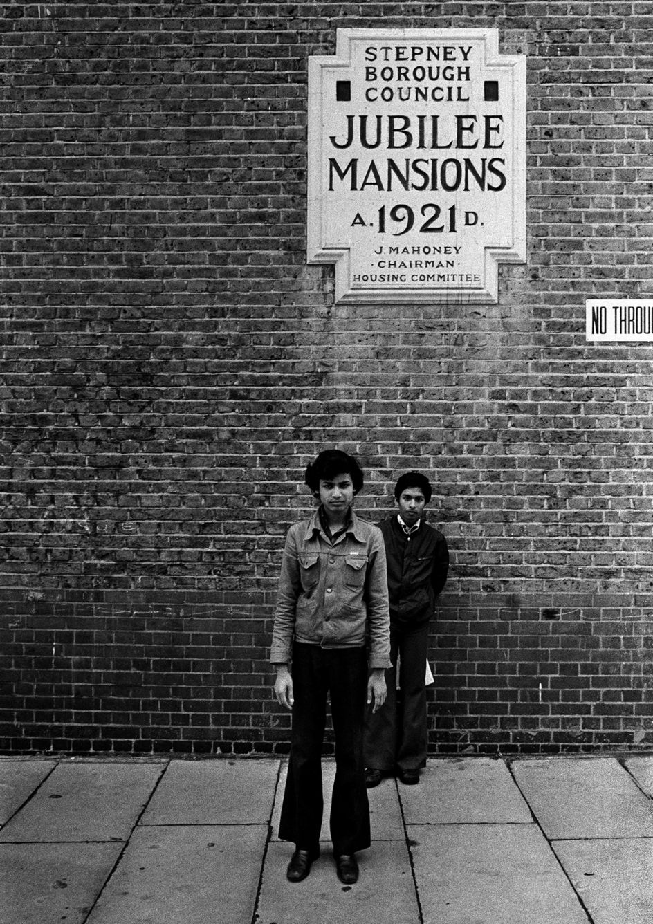 Jubilee Street, Stepney, London 1977. The photograph was taken during the celebrations of Queen Elizabeth II Silver Jubilee as a statement of reaction to Britain’s multiculturalism