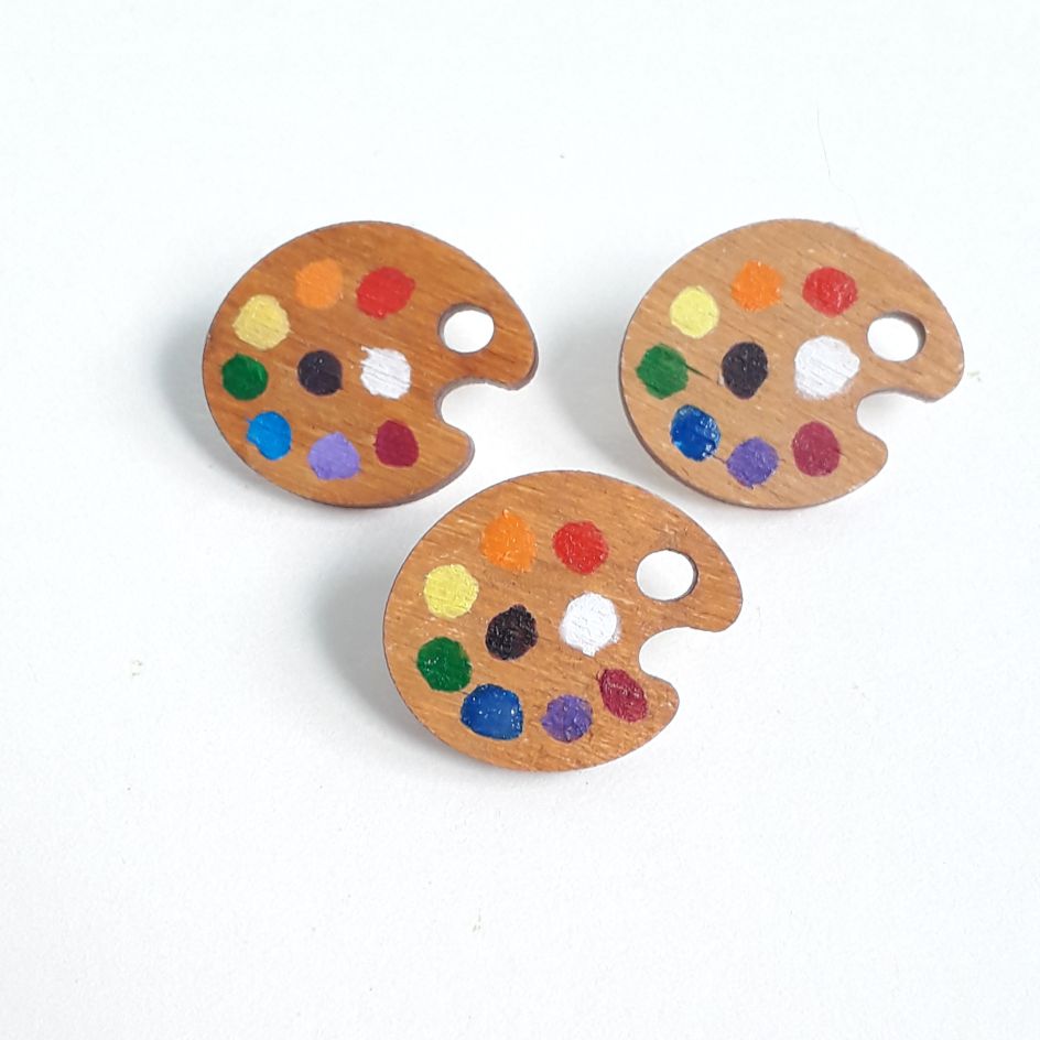 Wooden paint palette pin badge by Kayleigh Tait
