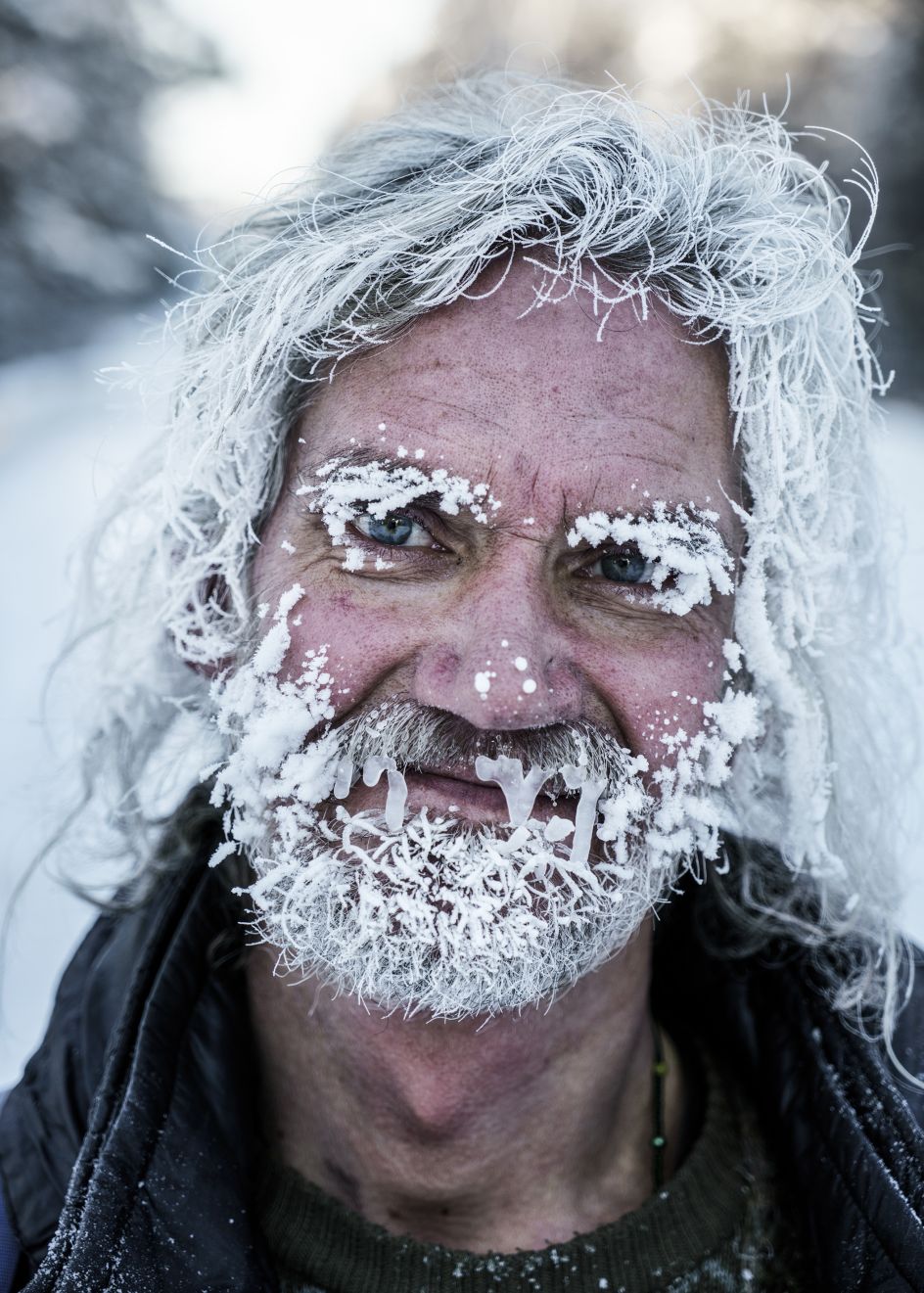 A disciple of Vissarion during a Christmas pilgrimage. Here, Vissarion's birthday January 14th is counted as the true Christmas. Russia, 2016| © Jonas Bendiksen/ Magnum Photos