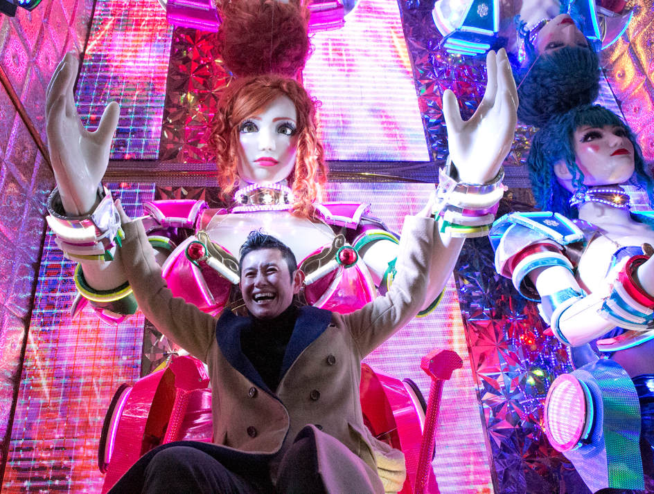 Chiga with Robot mannequins, Copyright © 2017  by Michel Delsol, originally  appeared in Edges of the Rainbow: LGBTQ Japan, published by The New Press.