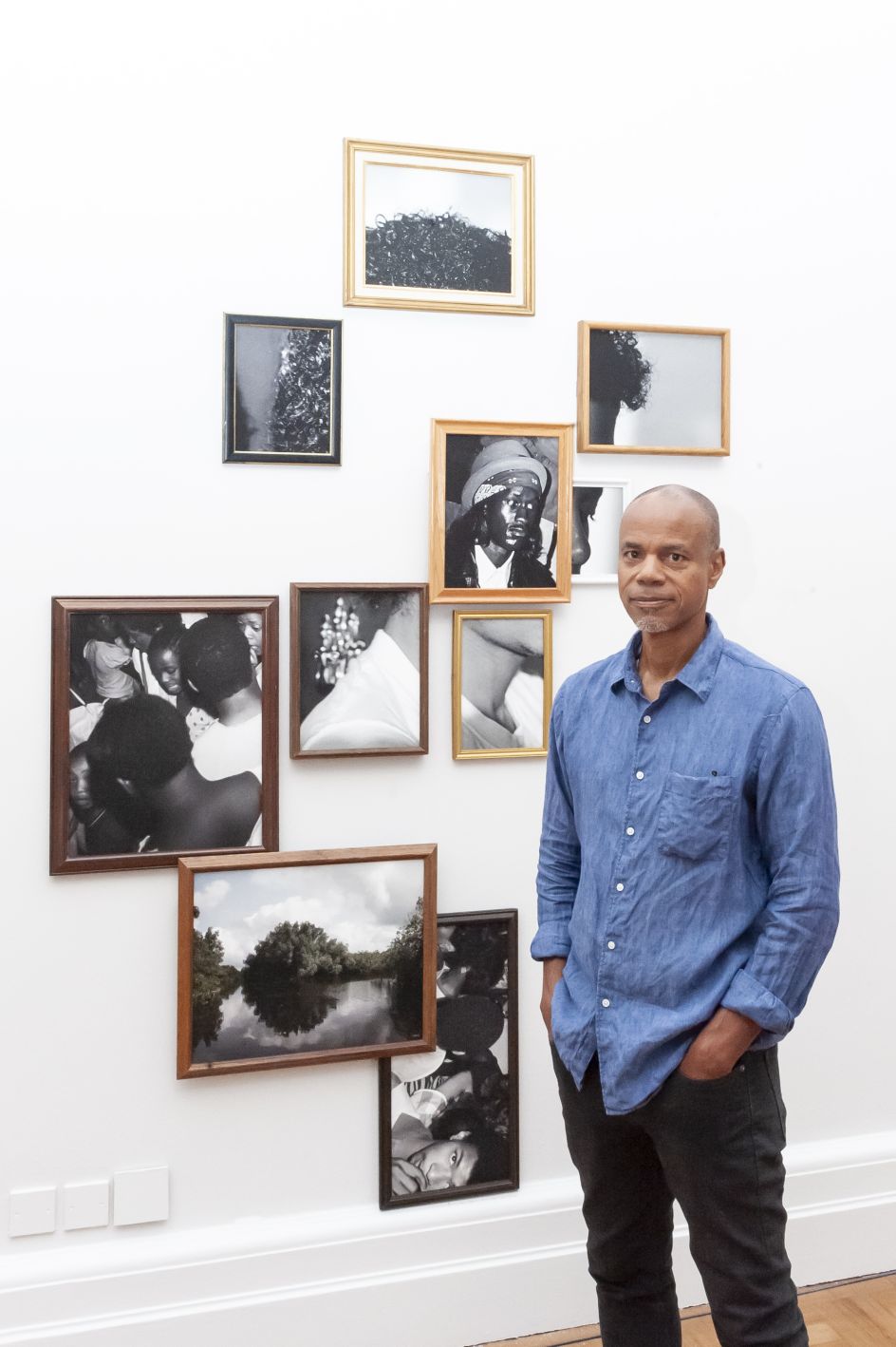 Todd Gray with his work, Exquisite Terribleness in the Mangroves 2014. Photograph by Jorge Herrera