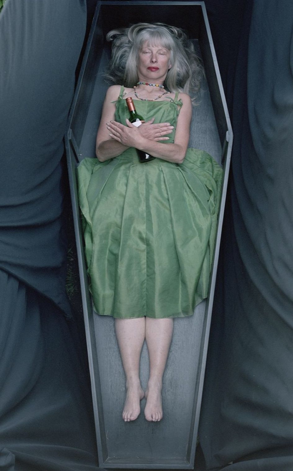 This is Lau's favourite death portrait. Judy likes her wine and is wearing her favourite dress for this portrait.