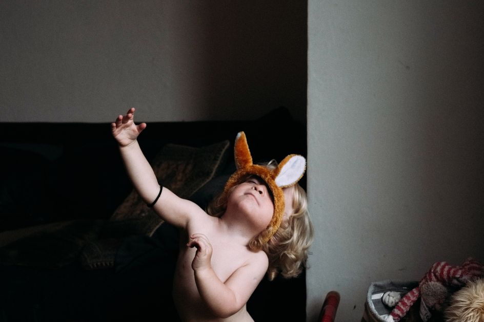 My daughter at home (mid 2016), oblivious and lost in a dream-moment.  It’s one of the more serene images from an ongoing project where I aim to capture the fleeting micro-events that form a part of family life | © Tim Topple, United Kingdom, Shortlist, Open, Portraits, 2017 Sony World Photography Awards