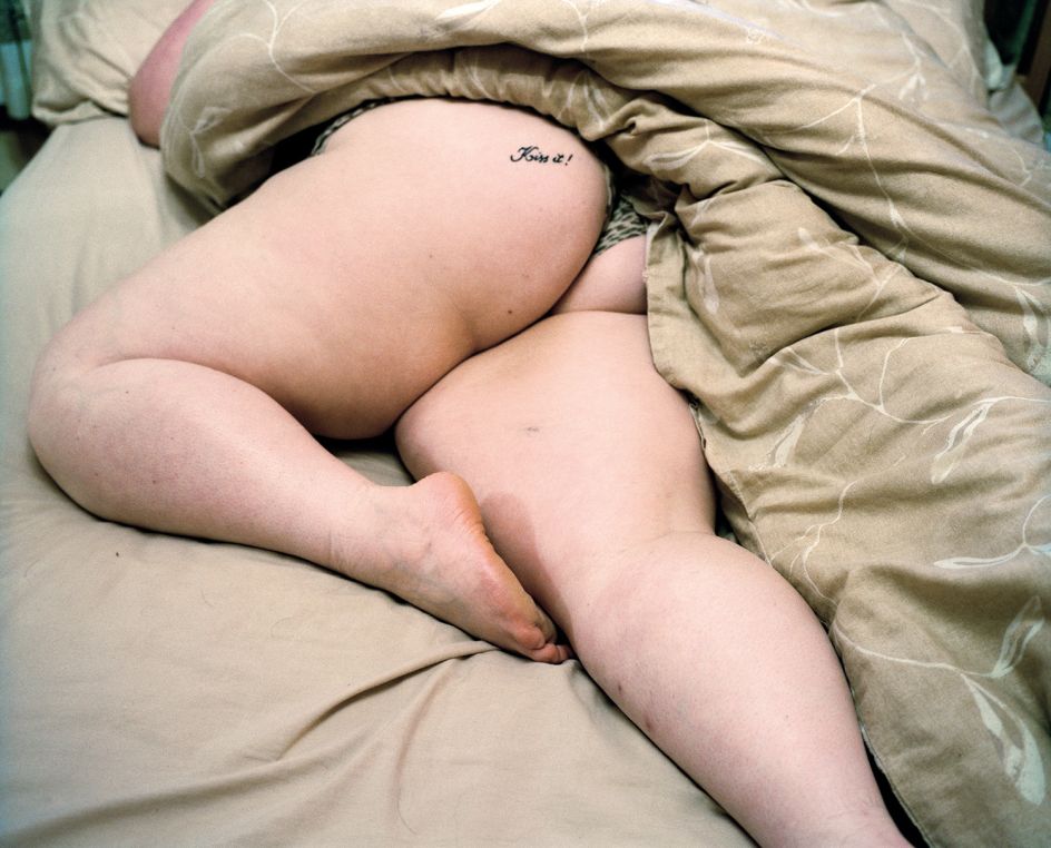 Shannon, age 16, has the words ‘Kiss it!’ tattooed. Sheffield, 2013 © Abbie Trayler-Smith