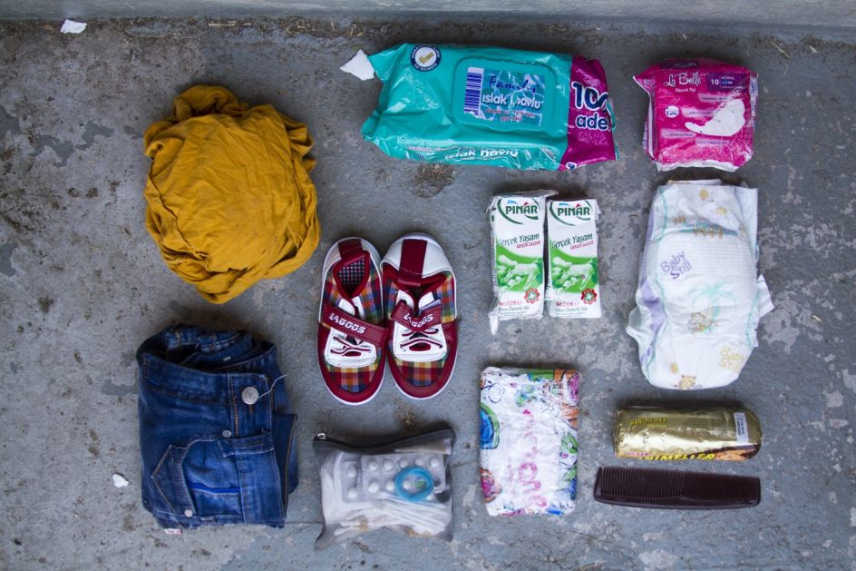 Diaper, personal documents and money, a comb