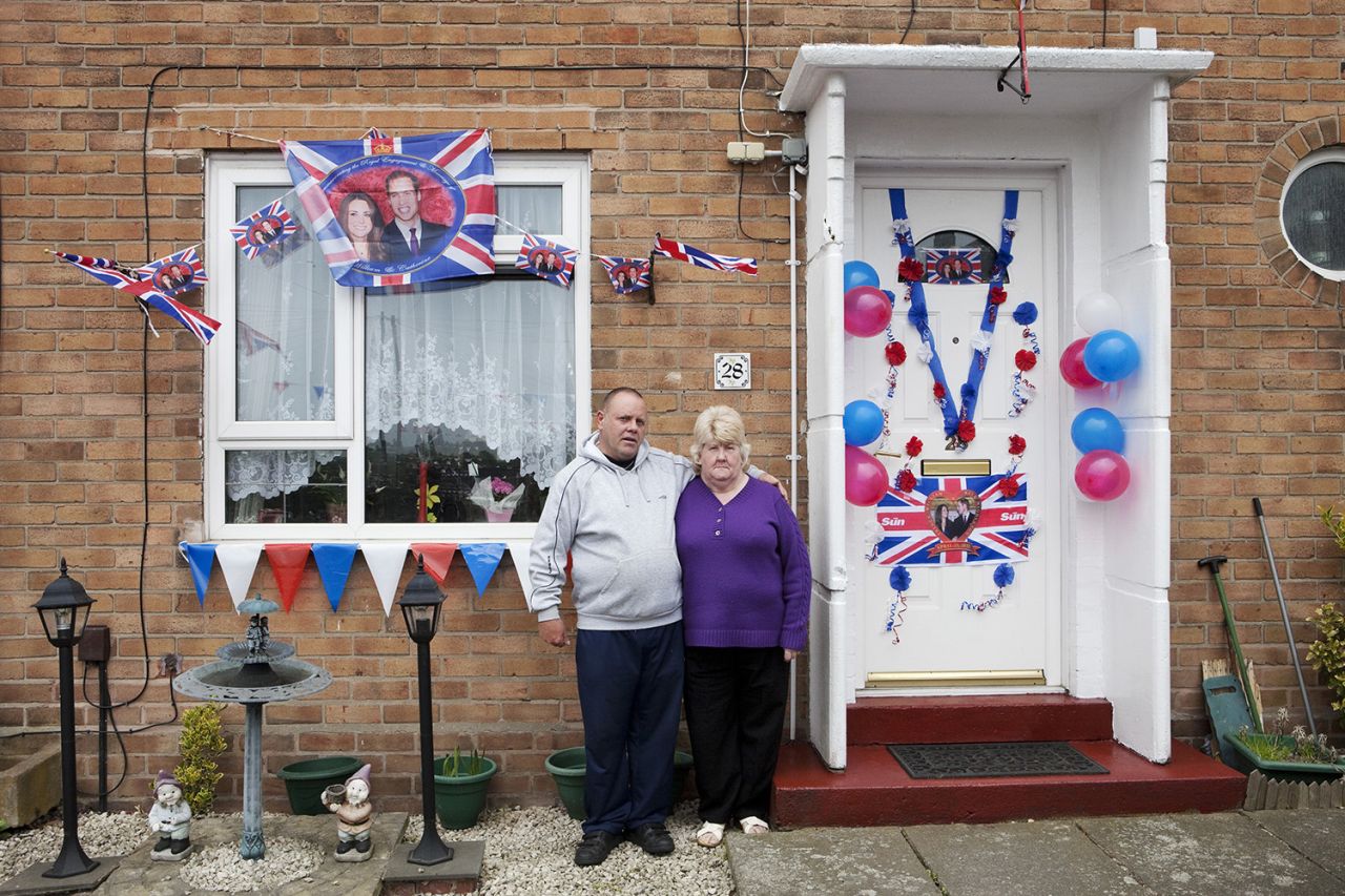 The Royal wedding between Kate Middleton and Prince William. Residents outside their home on Clare Road, Walsall, The Black Country, England, UK, 2011. From the series ‘Black Country Stories’. © Martin Parr / Magnum Photos