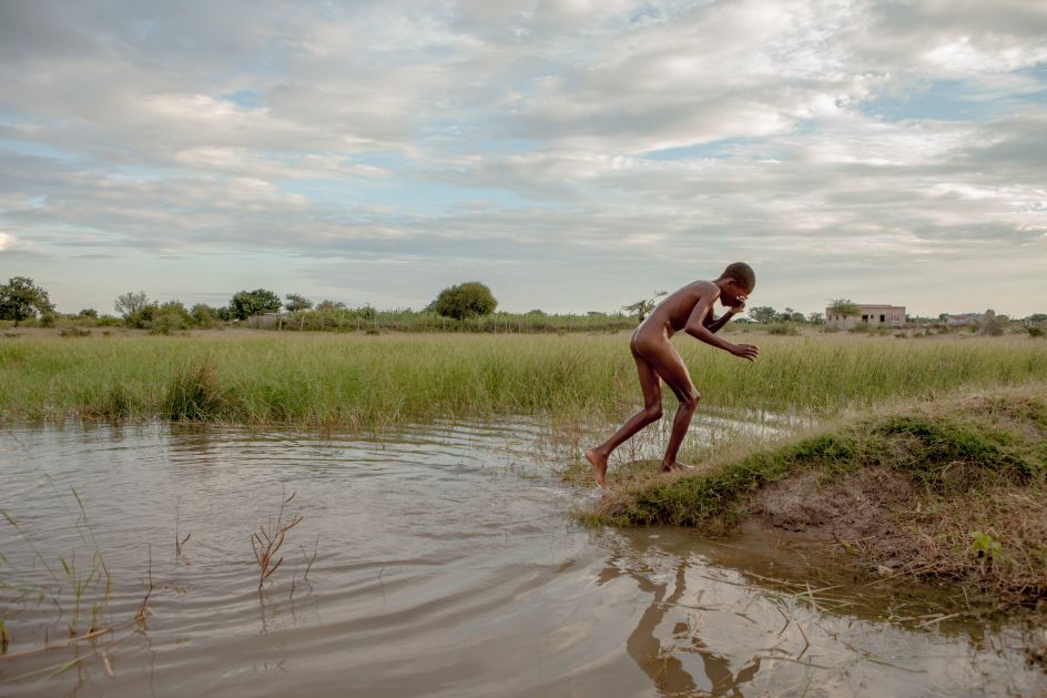 Kids in south Angola enjoining the return of the rain, after more than a year of drought