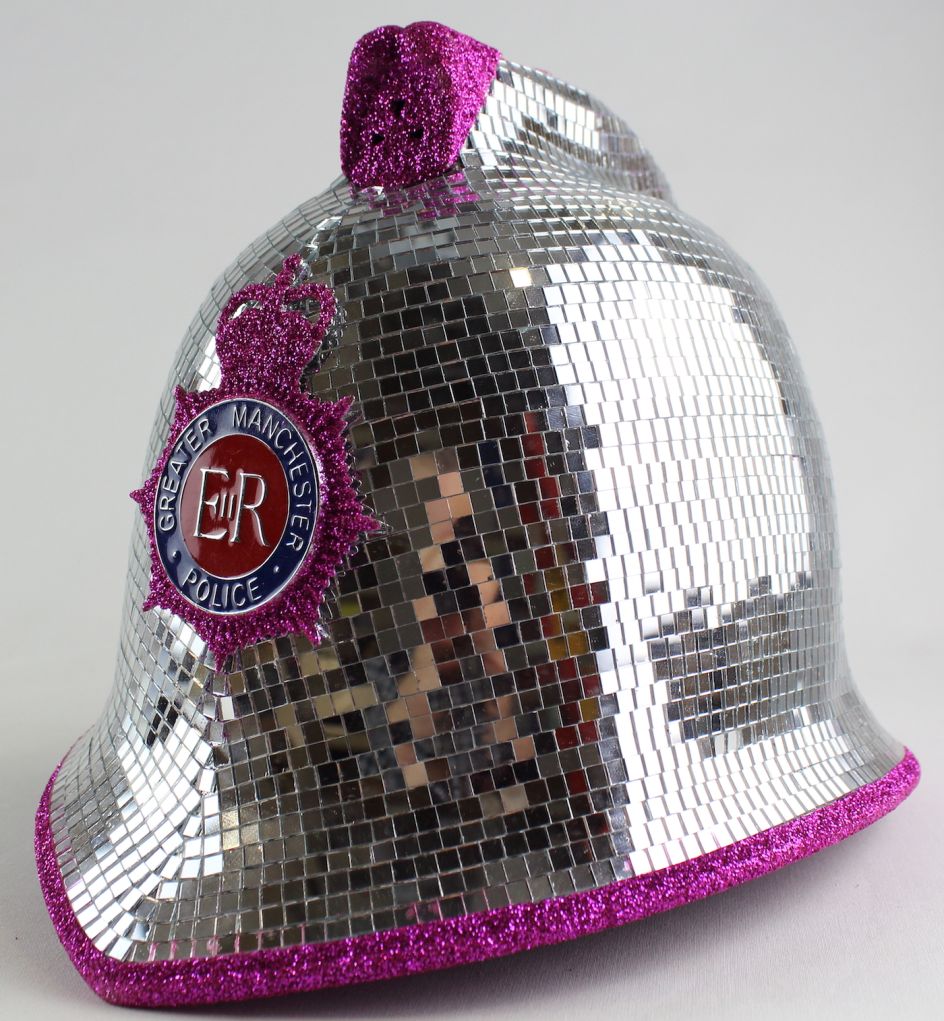 ‘Bobby Dazzler’ police officer’s helmet used at Manchester Pride, 2016, Courtesy of Greater Manchester Police Pride Network and Brett Dearden (designer)