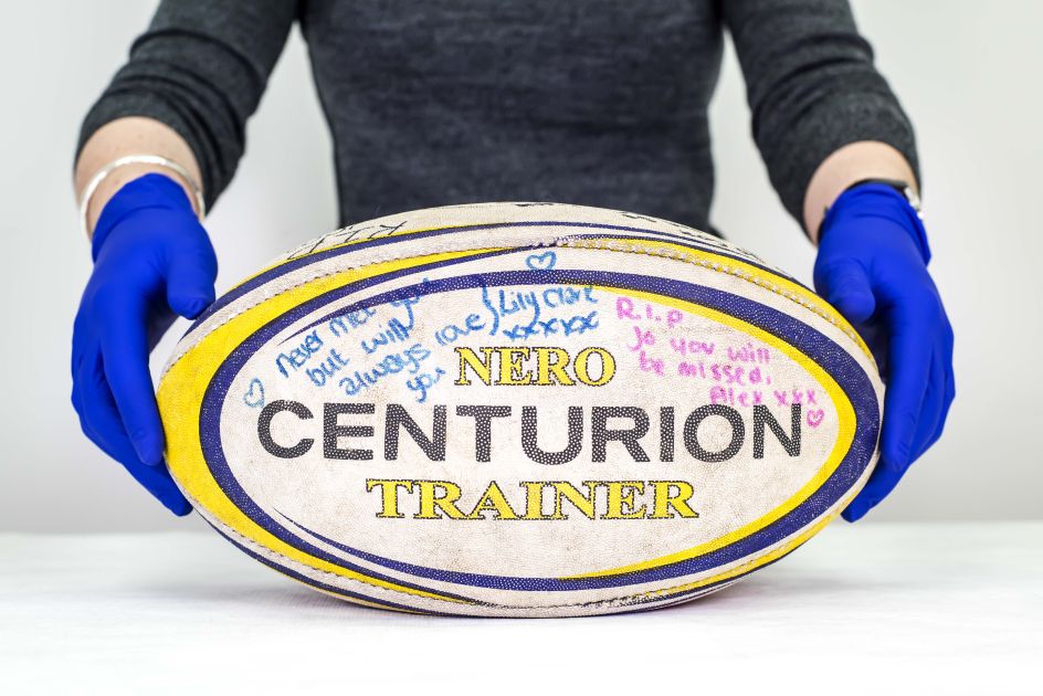 Batley Bulldogs rugby ball signed by the girls' rugby team, 2016. Courtesy of Jo Cox's family. More in Common - in memory of Jo Cox exhibition at People's History Museum