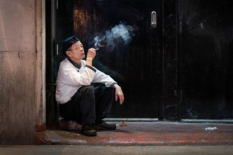 Photographs of 'smoking chefs' found in the back alleys and doorways of  London's Chinatown