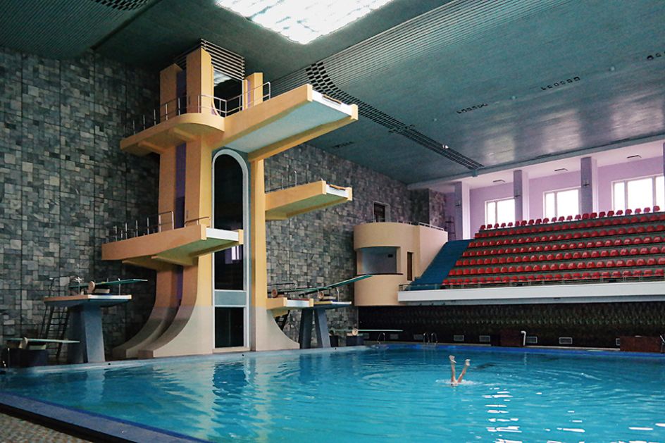 The Changgwang Health and Recreation Complex was the city’s flagship health centre when it opened in 1980. Covering an area of almost 40,000 square metres, it contains a sauna, bathhouse, swimming pools and hair salons – where customers can choose from a range of officially sanctioned haircuts. In a futuristic touch, the diving boards are reached by a mechanical elevator in a shaft faced with smoked glass. Copyright: © Oliver Wainwright