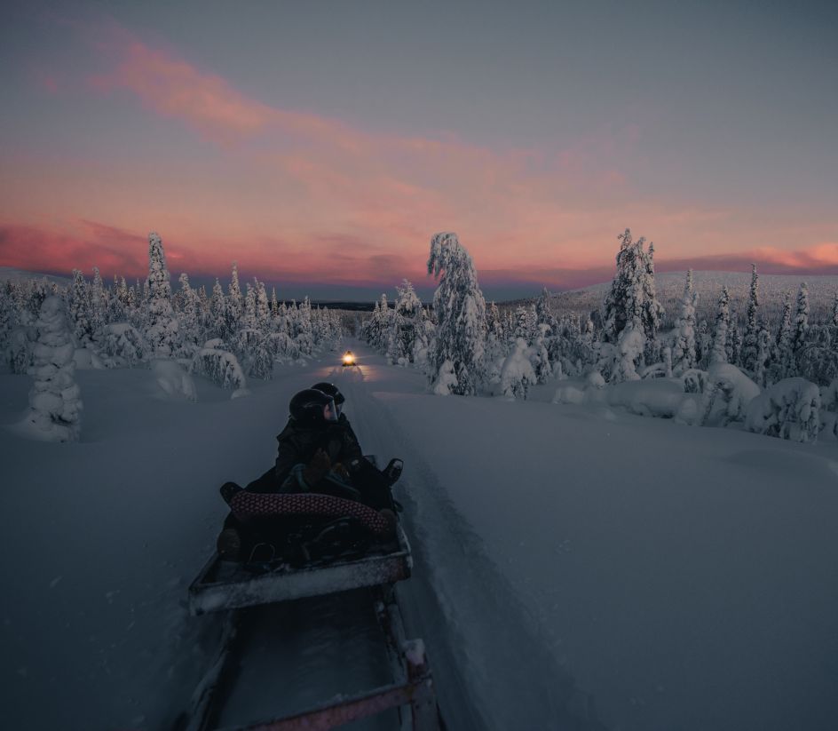 Scientists driving snow mobile to Pallas Sammaltunturi station, Finland © Konsta Punkka