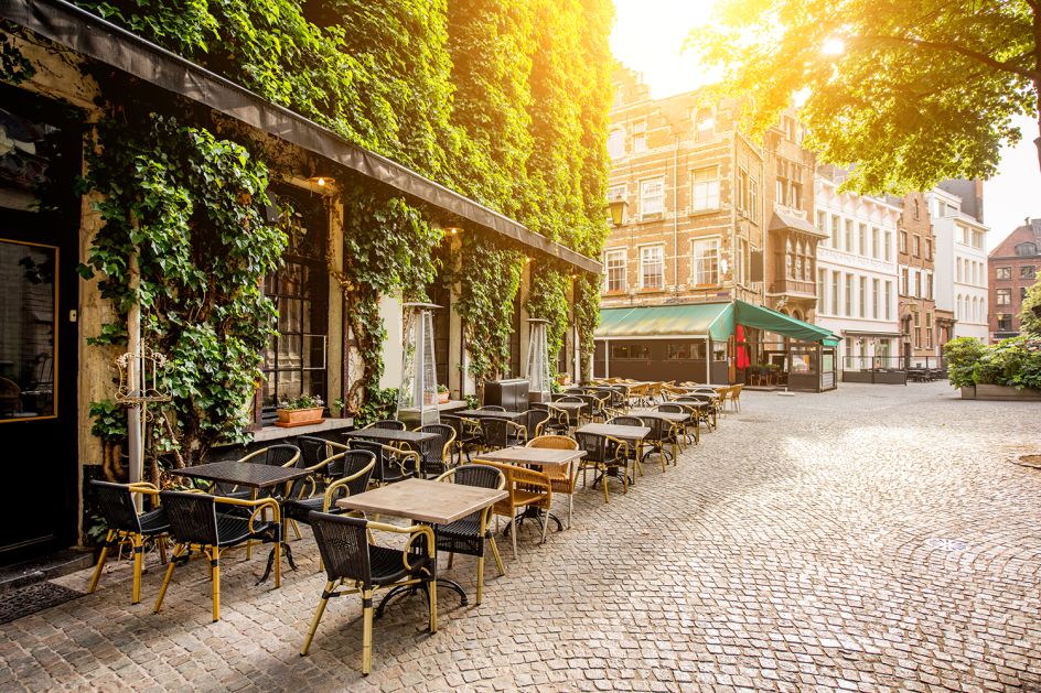 Street view with cafe terrace during the morning in Antwerpen city in Belgium, Adobe Stock