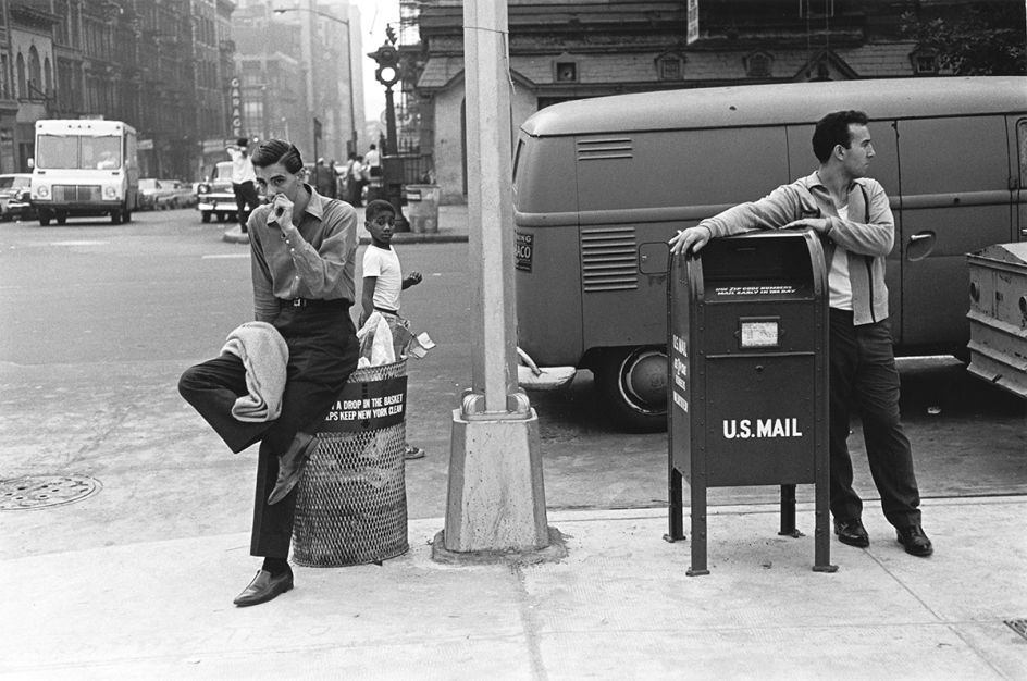 Two young men waiting at the corner, 1965