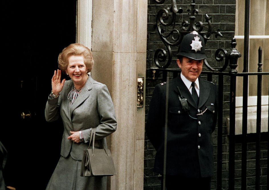 Margaret Thatcher outside 10 Downing Street with Asprey handbag, following a meeting with the Queen, 1987. Photo Credit John Redman/AP Shutterstock