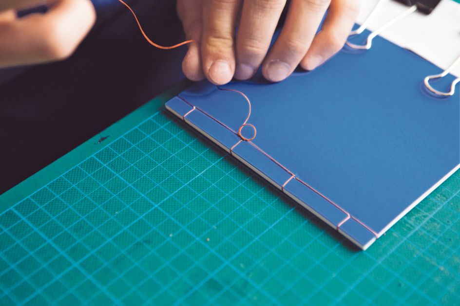 Book binding with LCBA