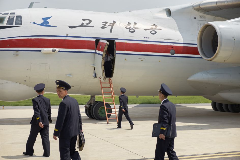 Pilots board an Ilyushin-76 transport plane