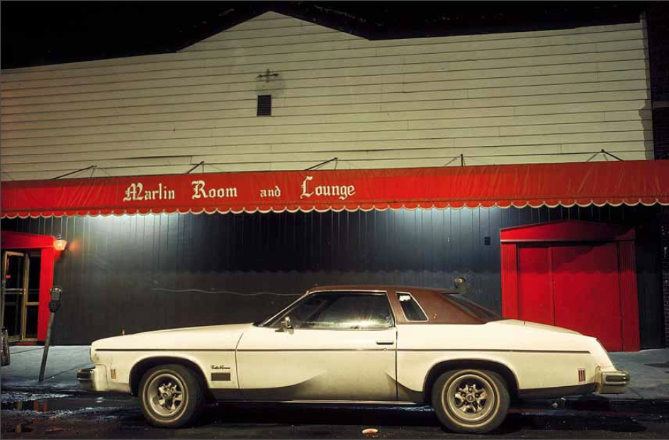 Marlin Room car, Cutlass Supreme in front of Marlin Room and Loundge connected to Clam Broth House, Hoboken, NJ, 1975 © Langdon Clay, courtesy Polka Galerie.