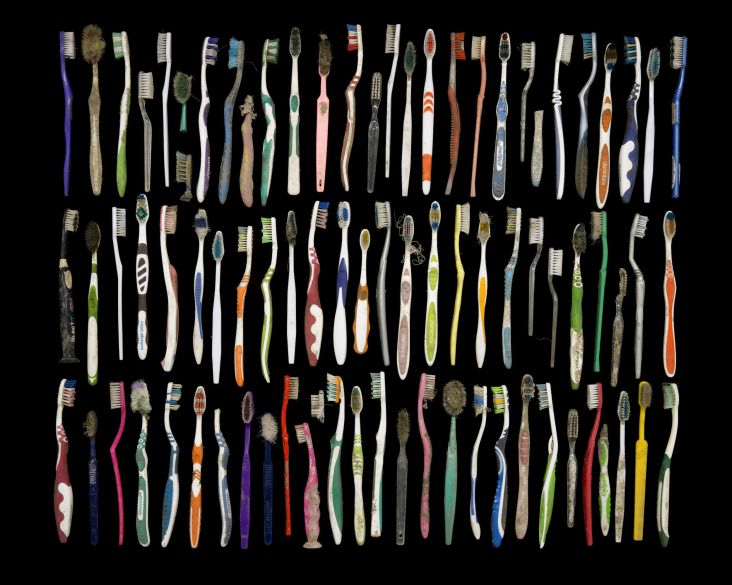 Fifty-four toothbrushes Collected 21 May, 15 September, 27 October and 28 October 2016 © Gideon Mendel