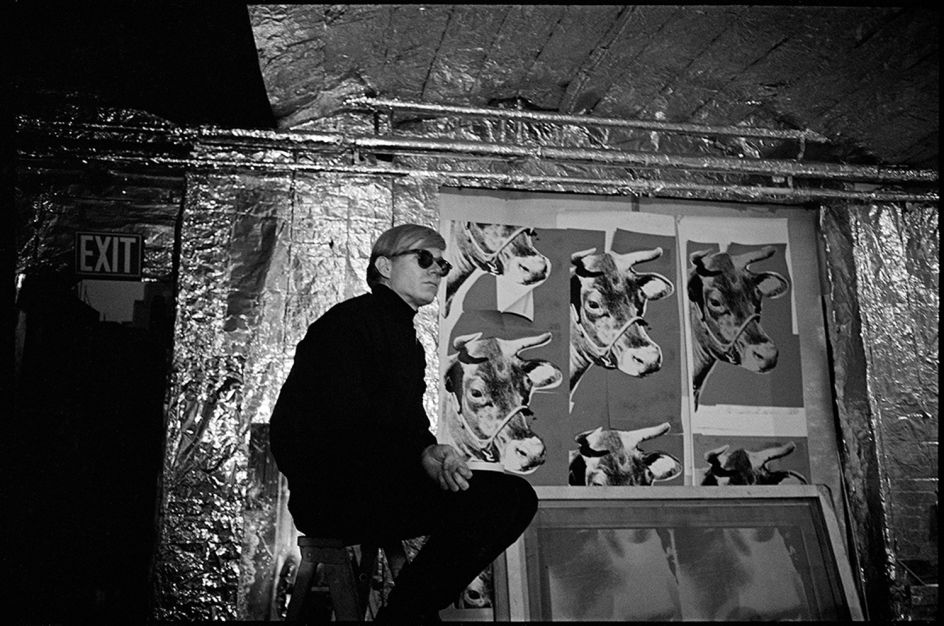 ‘Andy with Cow Paper’, The Factory, New York, 1966. © Nat Finkelstein Estate