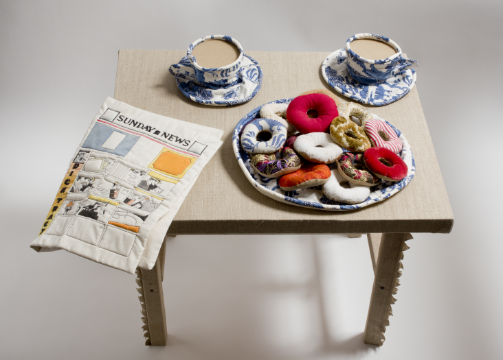 Jann Haworth, Donuts, Coffee Cups and Comic, 1962, Fabric, thread and kapok, Wolverhampton Arts Centre © Courtesy of the artist