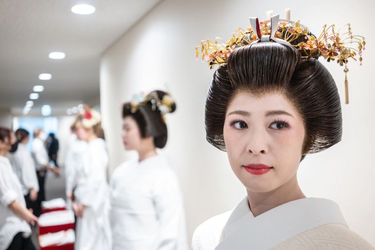 Model waiting backstage for a Bridal Kimono competition at the International Beauty Forum 2023, Yamano Beauty College. Shibuya City, Tokyo
