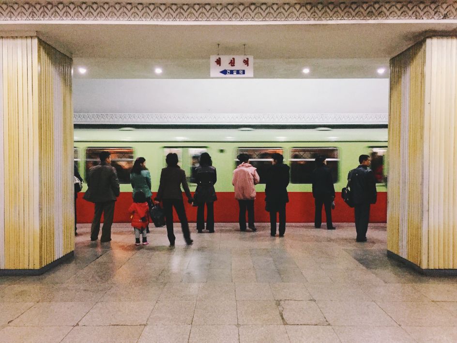 Folks lined up for the next subway train.