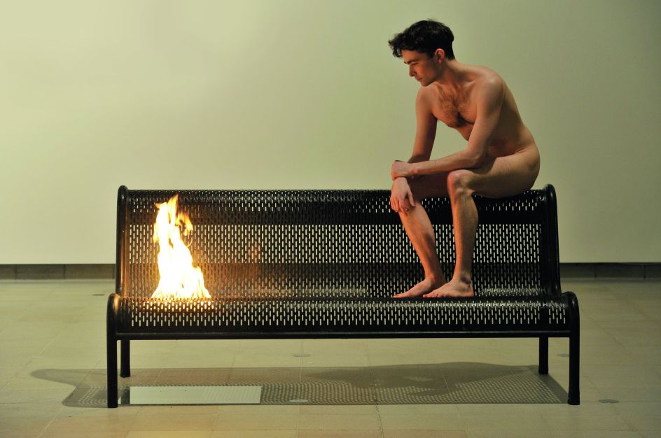 Roger Hiorns, Untitled, 2005–10, bench, fire and youth, dimensions variable; Installation view, ‘British Art Show 7: In the Days of the Comet’, Hayward Gallery, London, 2011. Picture credit: © Roger Hiorns. All Rights Reserved, DACS 2018