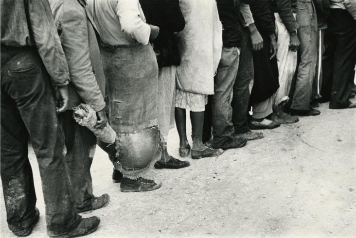 Migrant Vegetable Pickers Waiting in Line to be Paid, Near Homestead, Florida, 1939 © Marion Post Wolcott courtesy Huxley-Parlour Gallery