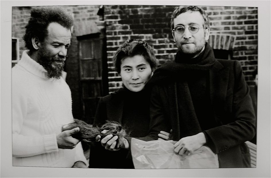 John Lennon giving Michael X his hair to auction, 1969. © Horace Ové