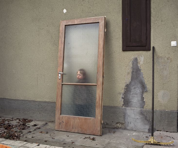 Momó with door, From the Series Middle, 2011  Momó with door, From the Series Middle, 2011. © Gábor Arion Kudász