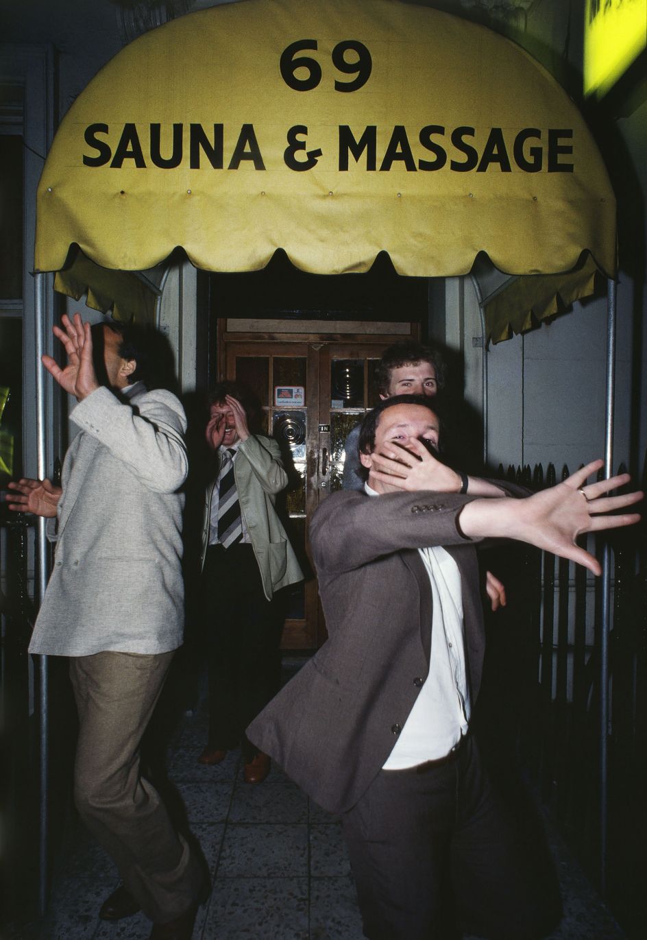 William Klein Men hidden their faces / 69 Sauna & Massage © William Klein Courtesy of the artist
