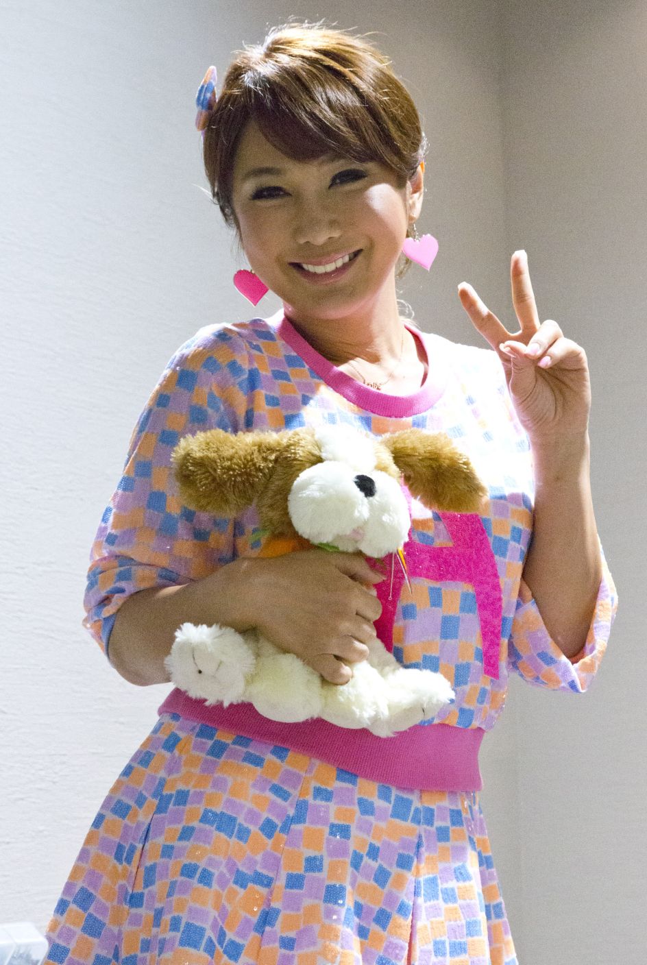 Ai Haruna leaving the hair salon, Copyright © 2017  by Michel Delsol, originally  appeared in Edges of the Rainbow: LGBTQ Japan, published by The New Press.