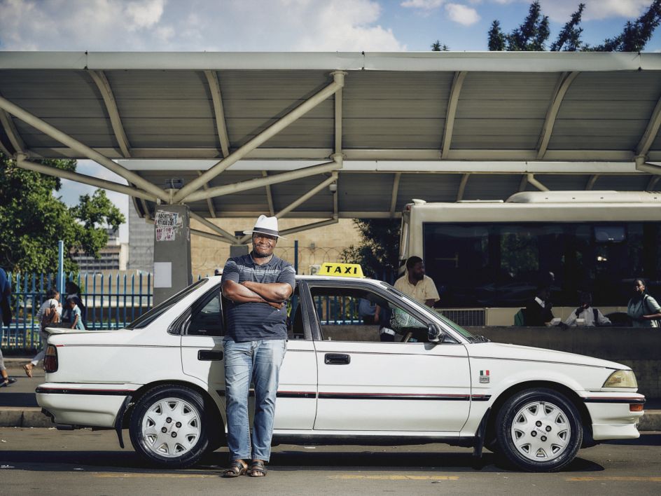 “People like the cheaper transport and Uber is cheap - cheap like buying bread! I used to have 11-12 trips a day, now, since Uber, it’s more like 6-7. But Uber drivers are brothers of Africa - I can’t do anything to them, the problem is the owner of Uber. The government of South Africa are very, very dumb - it is they who have caused the problem - Zuma is like Mugabe!   I would like to say this to the head of Uber: ‘Uber must go back to San Fransisco. They are not welcome - they are bulldozing our business and they are like an octopus that wraps their arms around you.’ People are saying ‘we would rather die’ … what’s the point!” - Michael, Johannesburg. The Uber Impact © Matthew Joseph