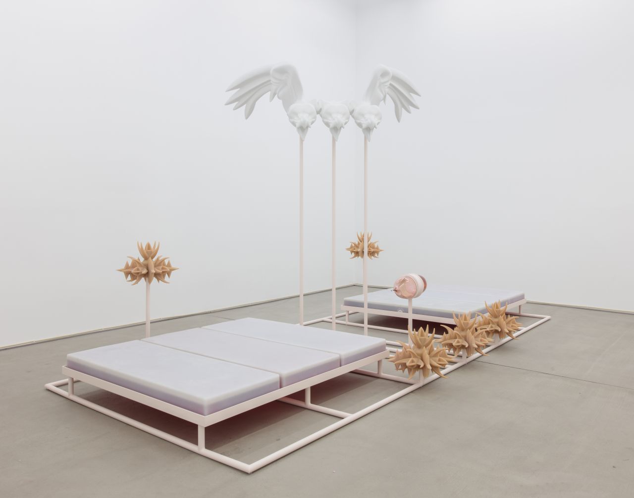 Marguerite Humeau HARRY II (BODY), 2017 Polystyrene, resin, fibreglass, white paint, acrylic parts, sprayed metal stand, water tanks, *raptors* – sourced on an anti-climbing security systems website – cast in artificial human skin, rubber, glass artificial Blood-sucking organ, artificial human blood, sound Stan Narten, JSP Photography  Courtesy the artist and C L E A R I N G New York / Brussels