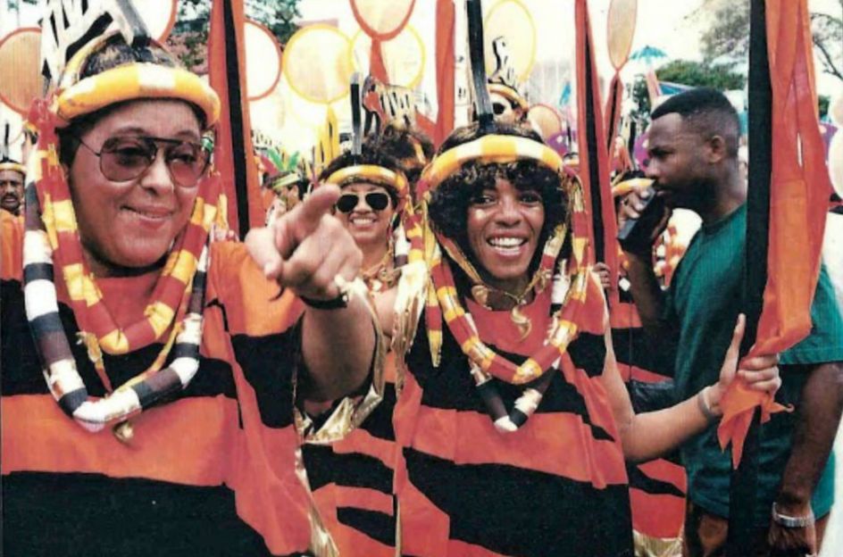 Margaret Busby and Jan Bain-Mottley playing with Peter Minshall's band, Trinidad, 1996 © Horace Ové