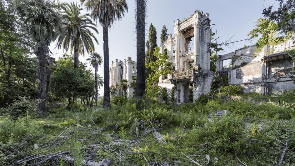The remains of a sanatorium alongside the Russian Riviera. Benefiting from a sub-tropical climate, this region was immensely popular for the Soviet-elite during the USSR era. This particular sanatorium was built in the early 1900s and severed heavily by shelling and gunfire during the Abkhaz-Georgian conflict. Sokhum, Abkhazia. © Reginald Van de Velde