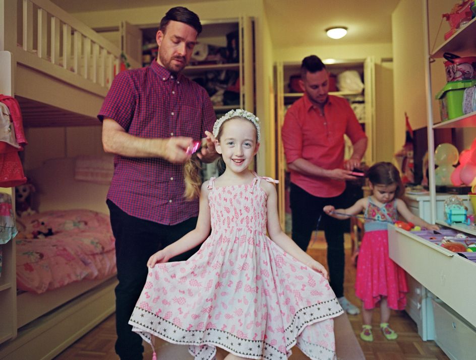 Milo with her fathers and sister. New York City © Bart Heynen from 'Dads' published by powerHouse Books