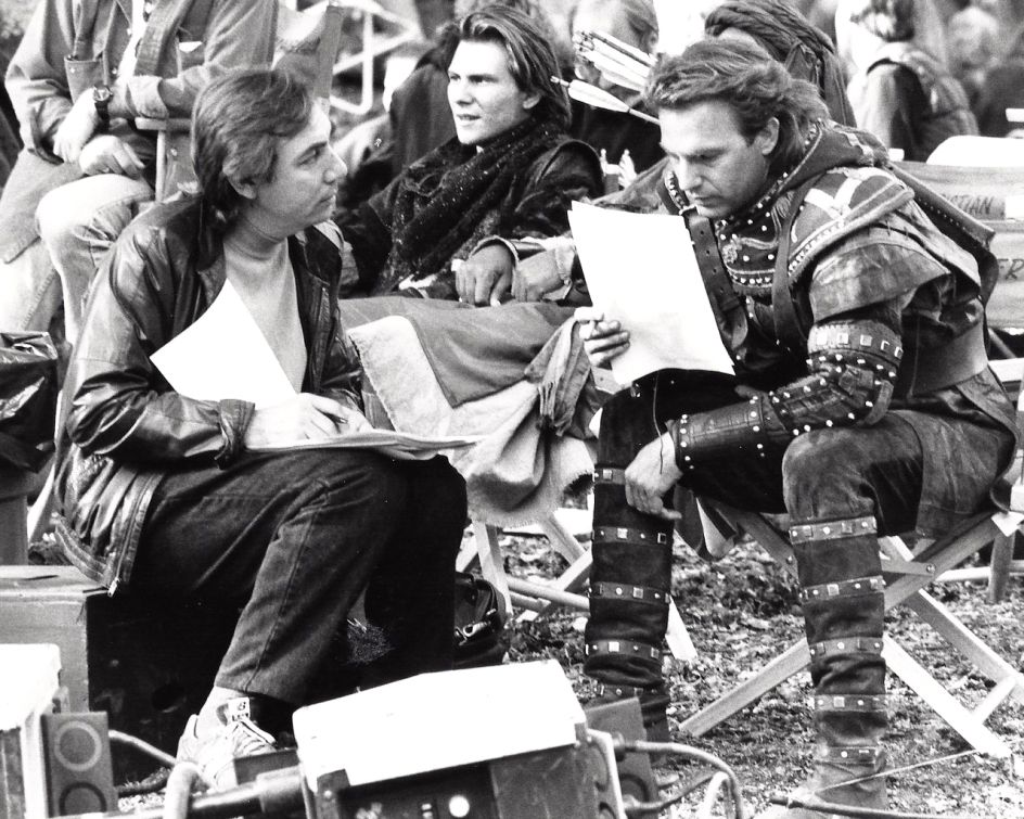 Pen Densham on set for Robin Hood: Prince of Thieves with Kevin Costner, with Christian Slater in the background