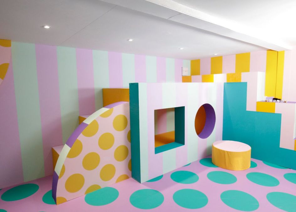 The bold colour and pattern of HOUSE OF DOTS' interiors are inspired by the LEGO DOTS range. Photo credit Getty Images.