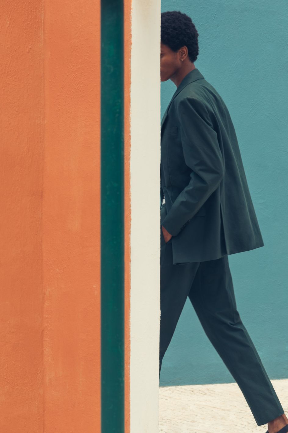 Rafael wears a suit by Acne Studios and a belt by Givenchy. Photography by Romain Laprade for Kinfolk Magazine