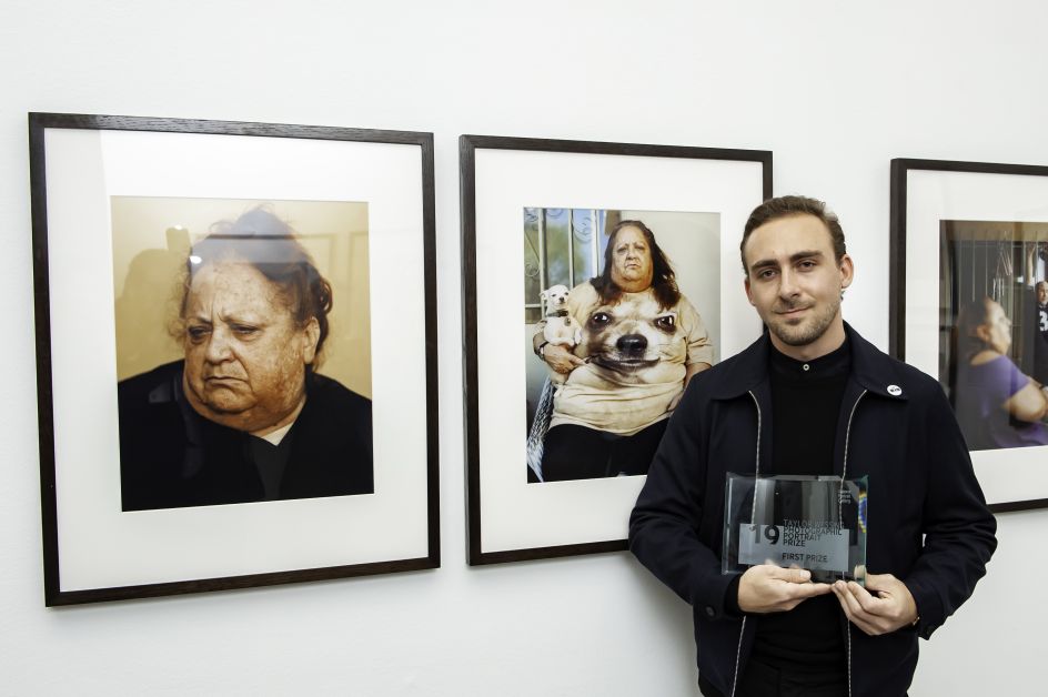 Pat Martin with his winning portraits. Photograph by Jorge Herrera